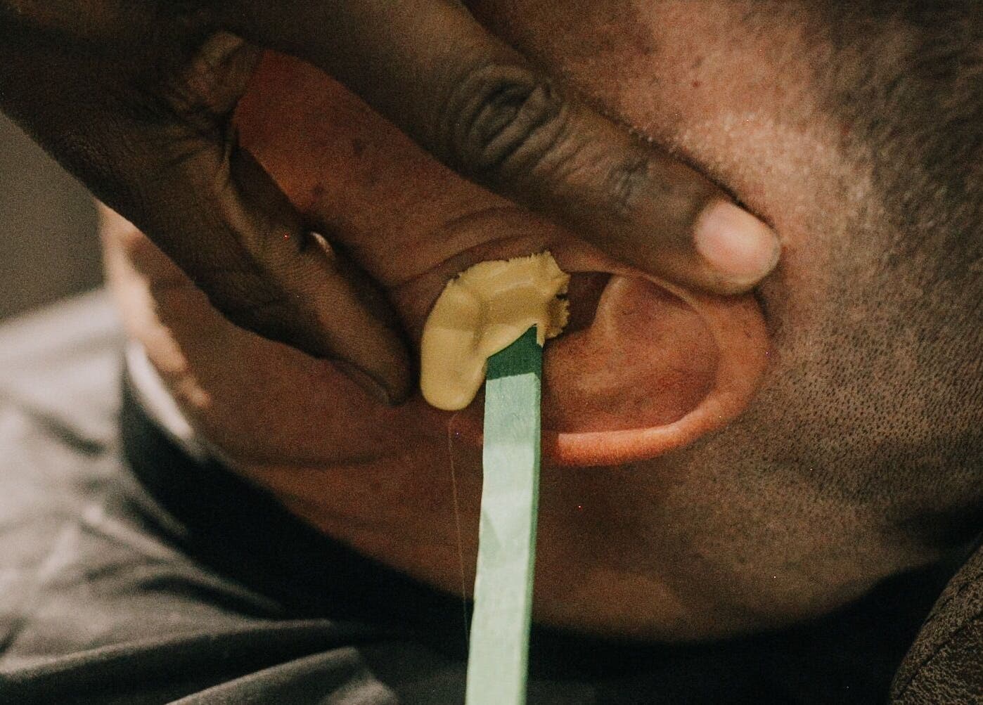 Ear waxing service at The Art of Man, Pretoria, Gauteng, ZA, enhancing grooming precision and care.