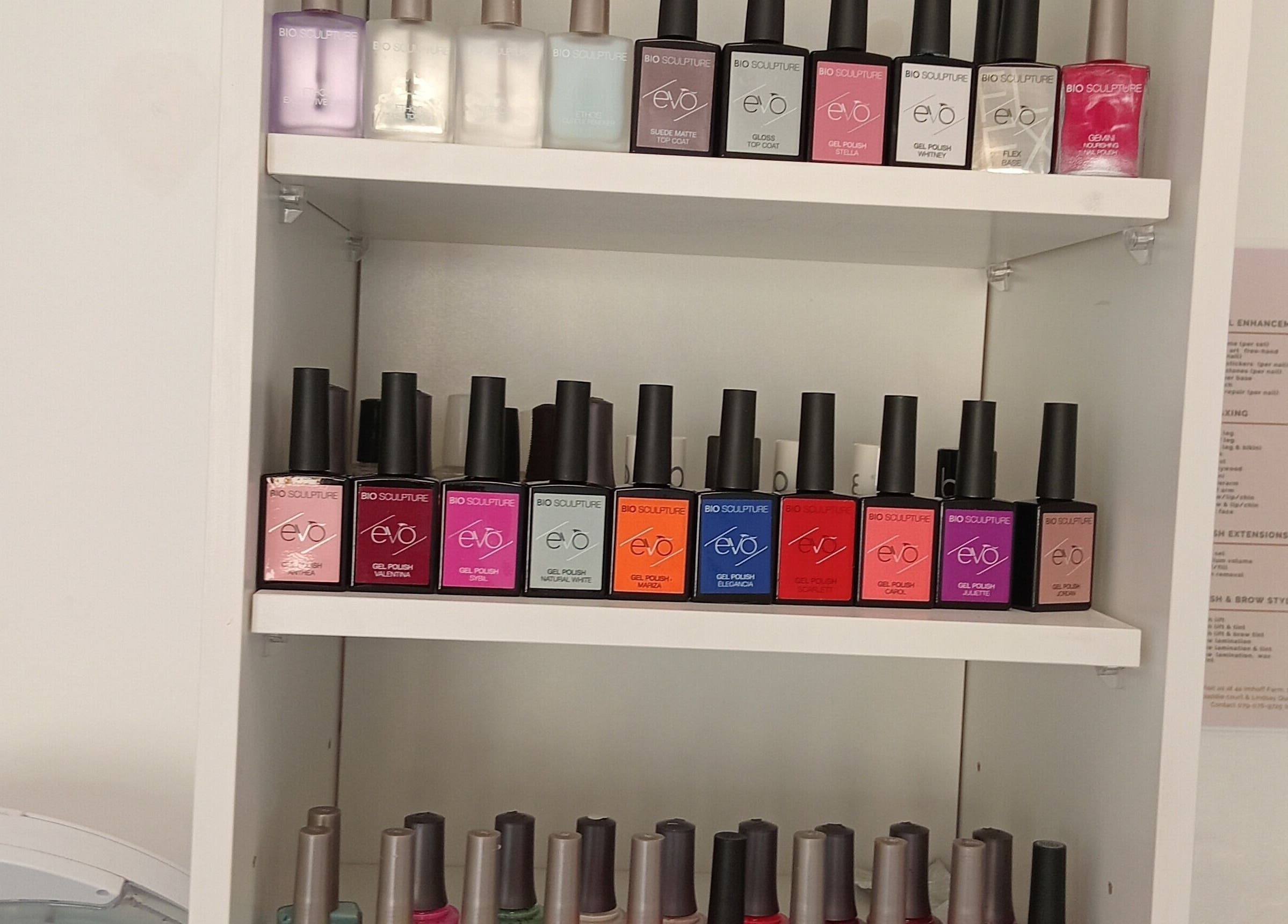 Colorful nail polish display at Ithongo in Cape Town, Western Cape, ZA. Various shades for beauty treatments.