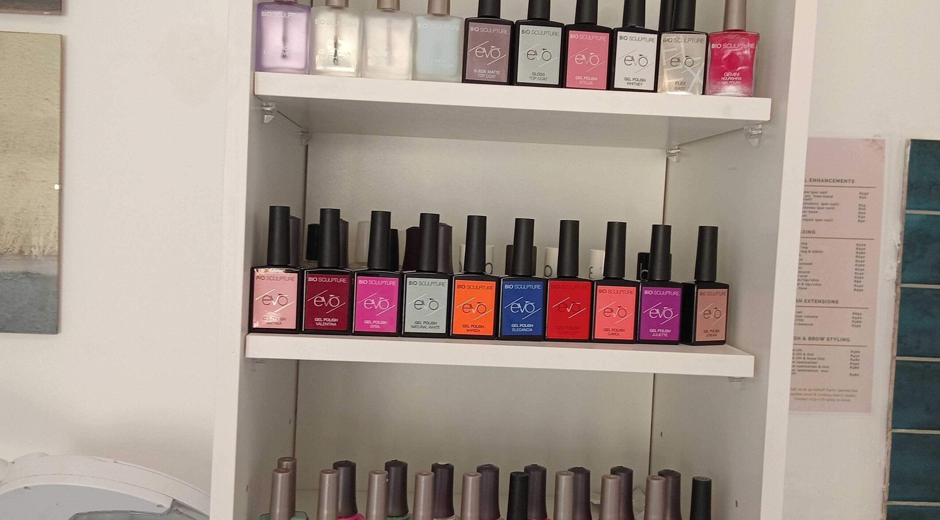 Colorful nail polish display at Ithongo in Cape Town, Western Cape, ZA. Various shades for beauty treatments.