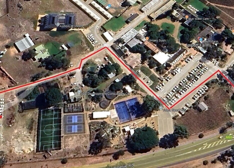 Aerial view of Ithongo location in Cape Town, Western Cape, ZA, showing surrounding facilities and landscape.