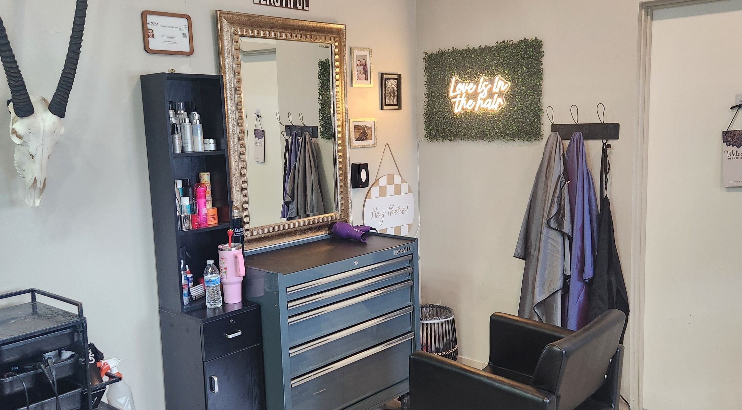 Cozy styling station at Hair by Shae in Eagar, Arizona features tools and decor.
