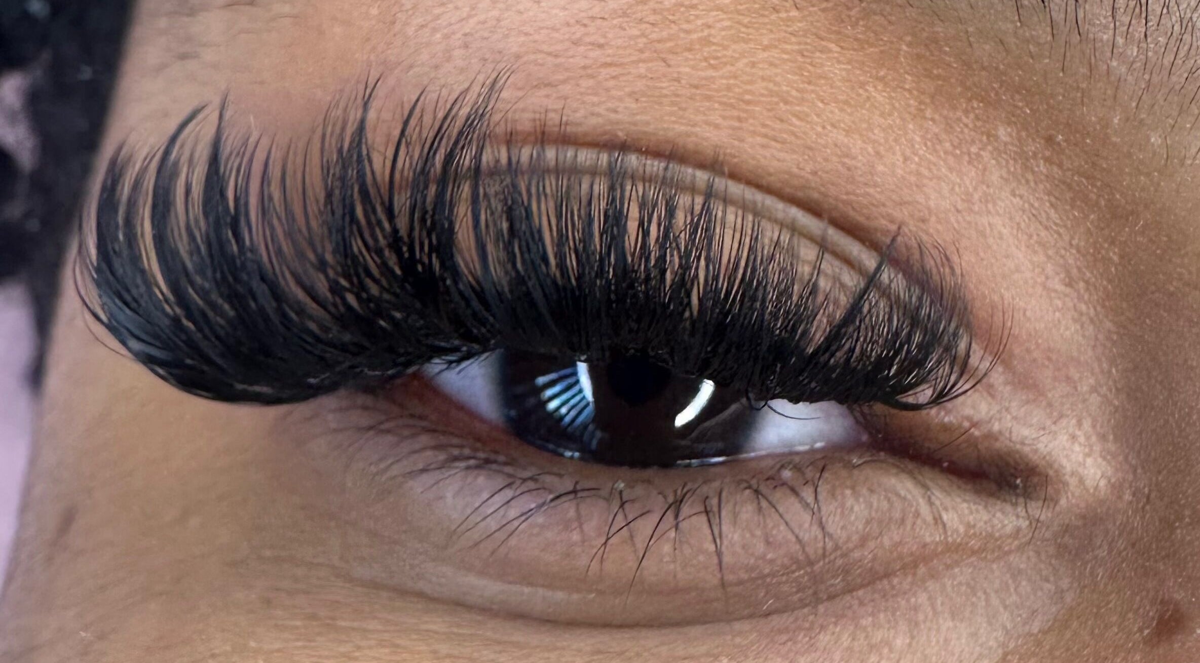 Close-up of expertly applied eyelashes at The Lashh Line, Edgbaston, Birmingham, England, GB.