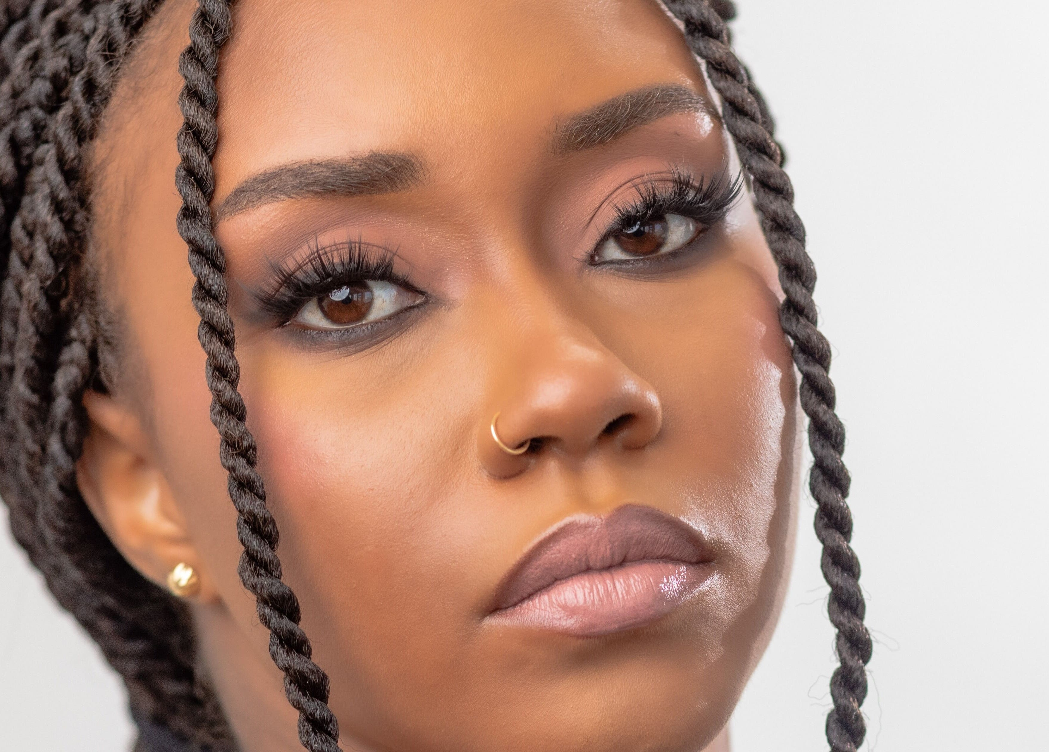 Elegant makeup and braided hairstyle at Glow Beauty, Cedar Grove, Saint John, AG.