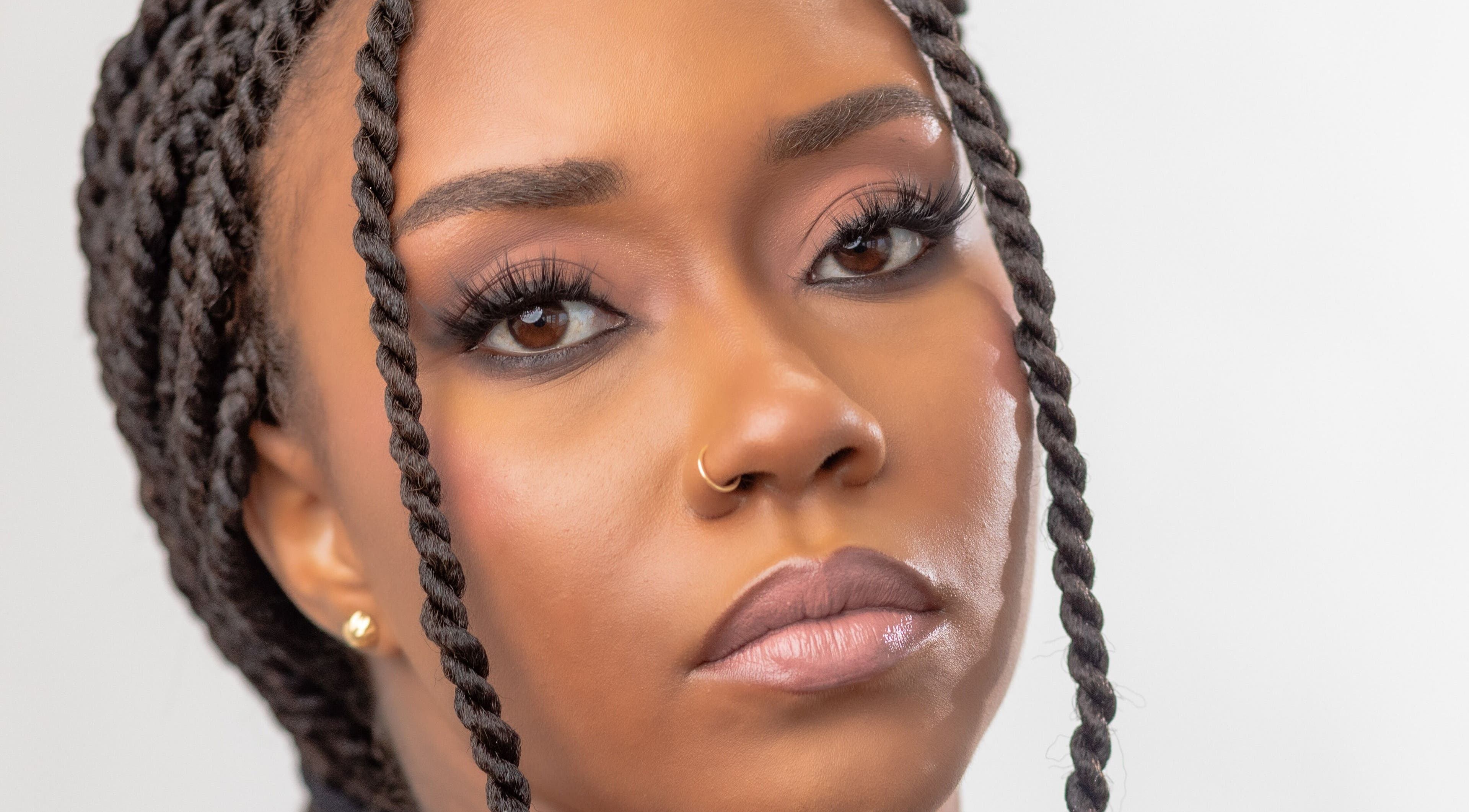 Elegant makeup and braided hairstyle at Glow Beauty, Cedar Grove, Saint John, AG.