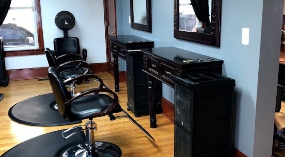 Elegant salon chairs at Divine Beauty Hair Salon in Front Royal, Virginia, US, reflecting a modern aesthetic.