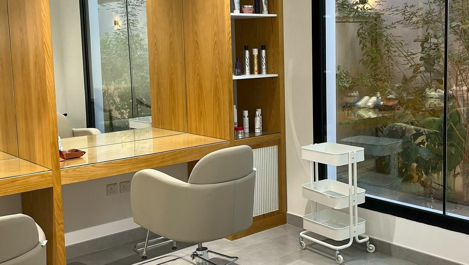 Modern salon corner at Ling Spa I لنق سبا, Riyadh, Riyadh Province, SA featuring sleek furniture and natural light.