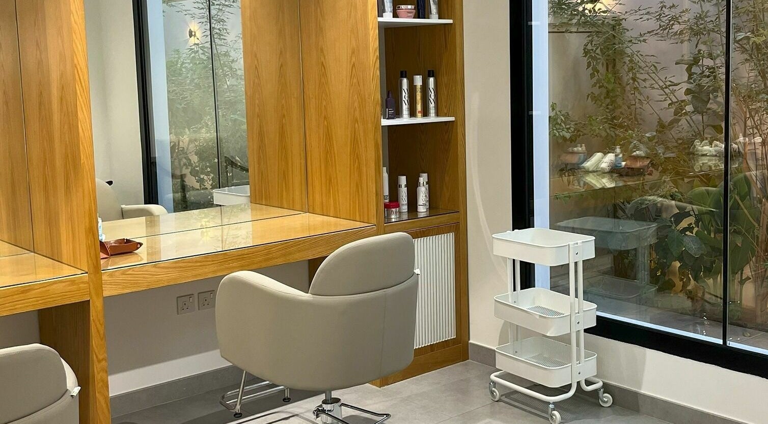 Modern salon corner at Ling Spa I لنق سبا, Riyadh, Riyadh Province, SA featuring sleek furniture and natural light.