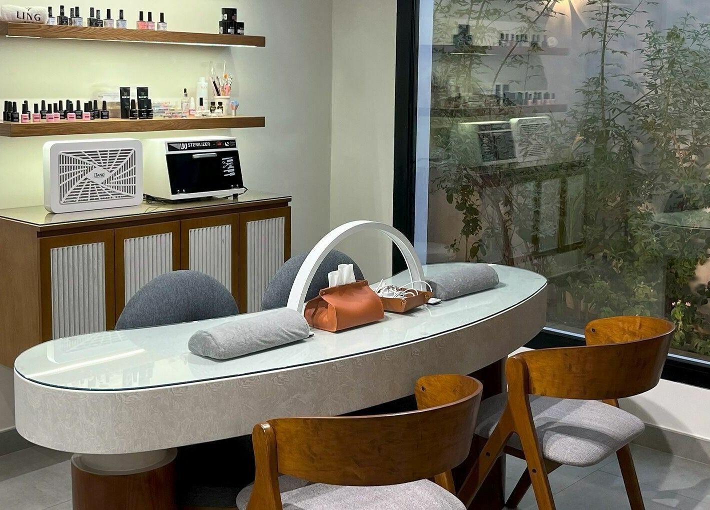 Stylish nail station at Ling Spa I لنق سبا, Riyadh, Riyadh Province, SA, with elegant seating and decor.