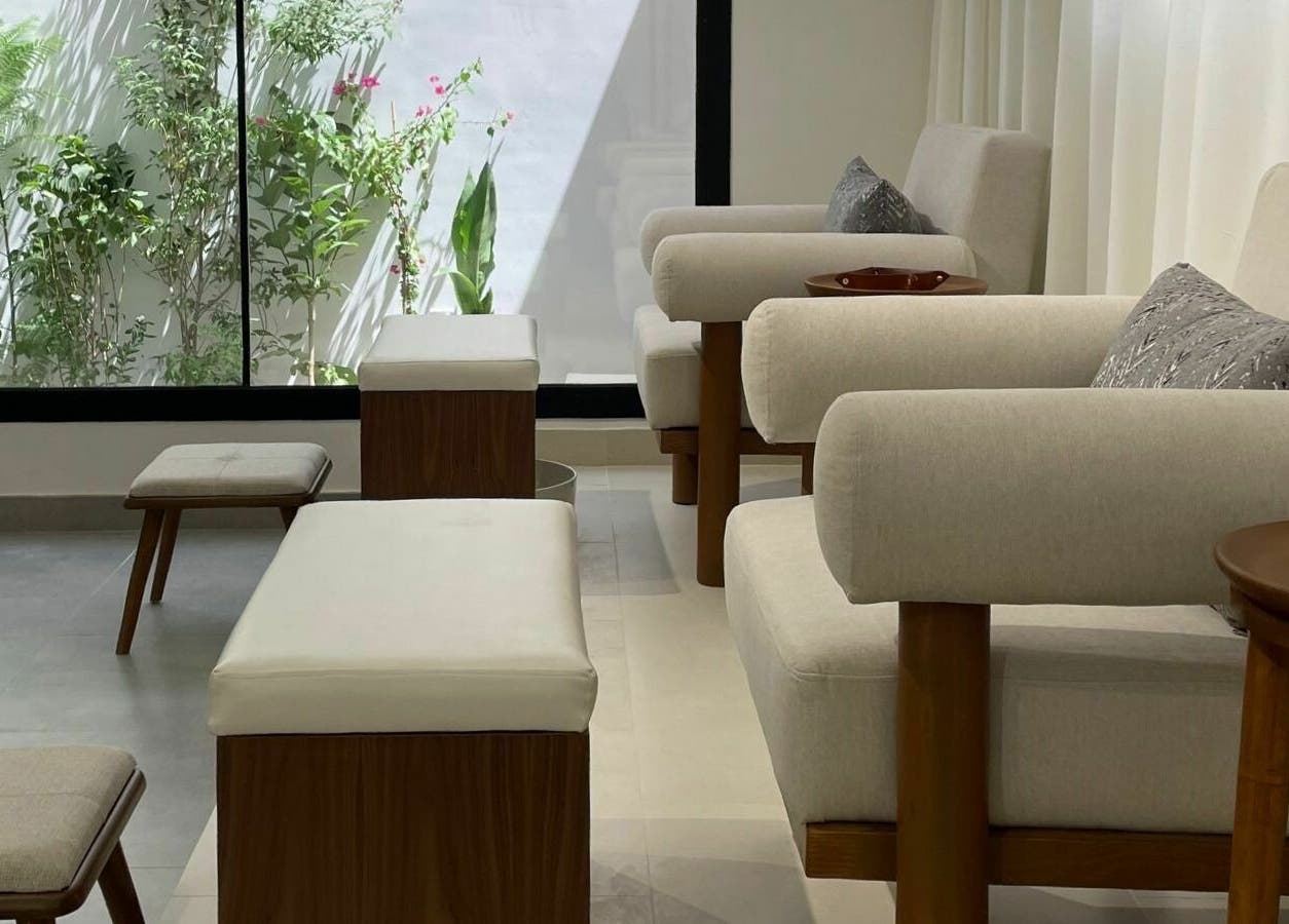 Relaxing seating area at Ling Spa I لنق سبا in Riyadh, Riyadh Province, SA with soothing greenery view.