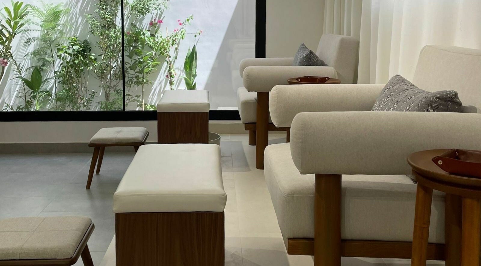 Relaxing seating area at Ling Spa I لنق سبا in Riyadh, Riyadh Province, SA with soothing greenery view.