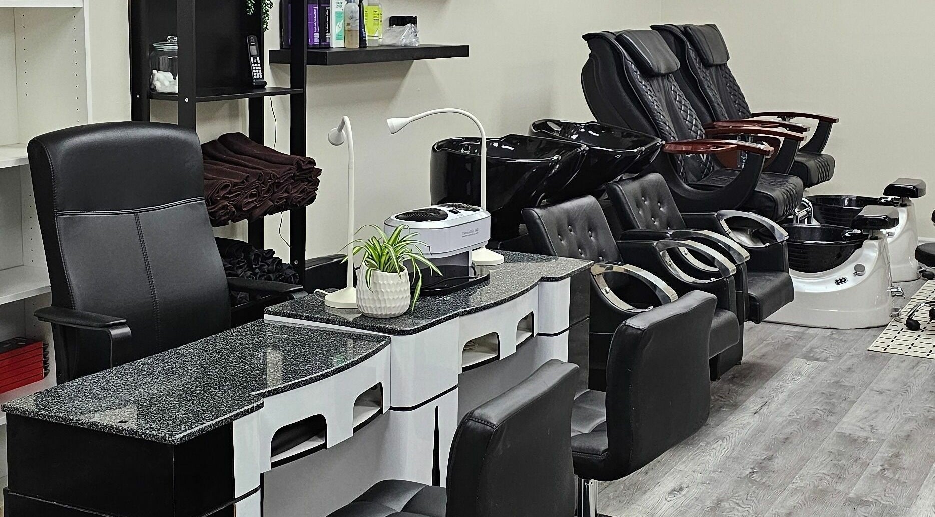 Elegant salon chairs and manicure stations at Your Choice Salon And Spa, Mississauga, Ontario, CA.