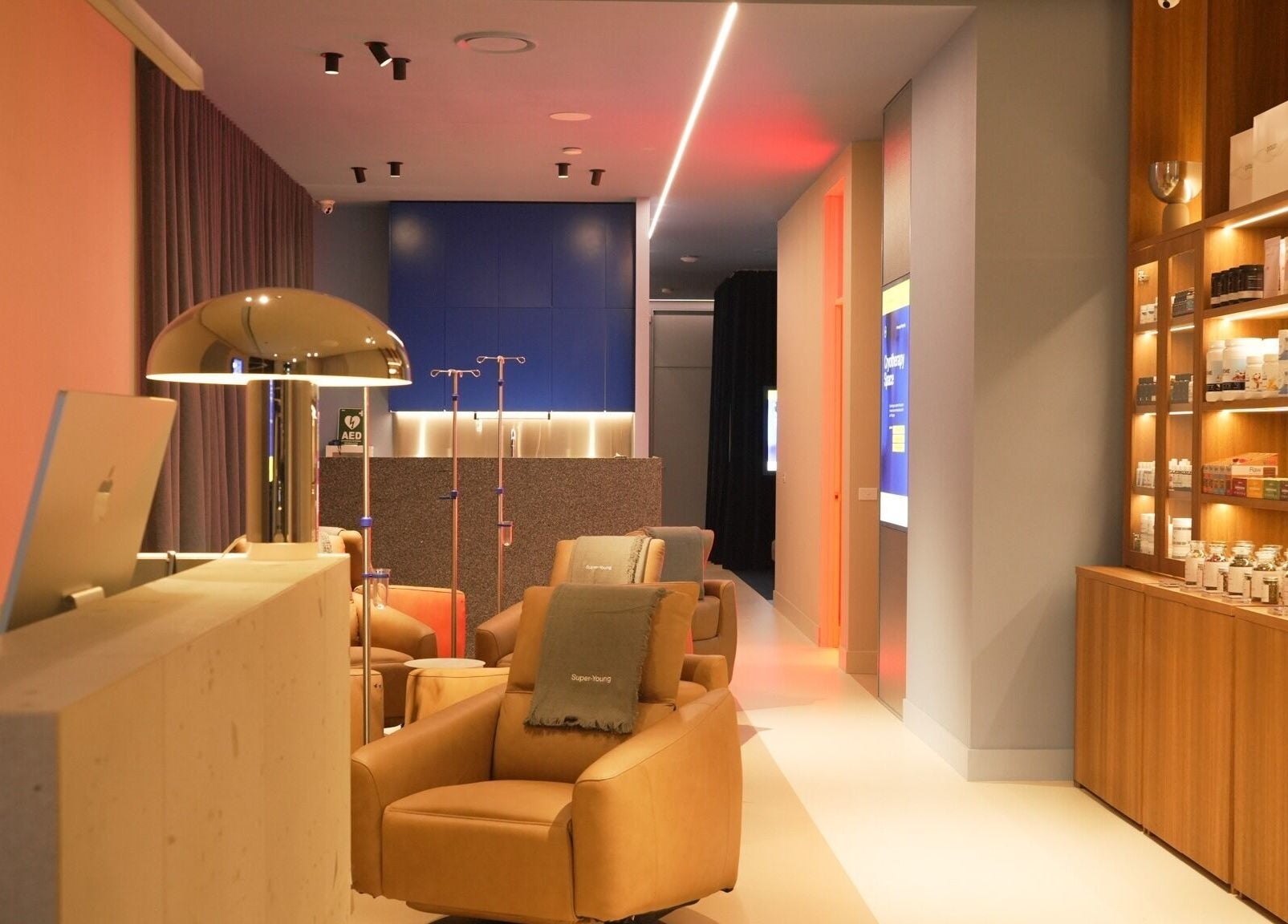 Elegant interior of Super-Young in Armadale, Victoria, AU, showcasing chic seating and ambient lighting.