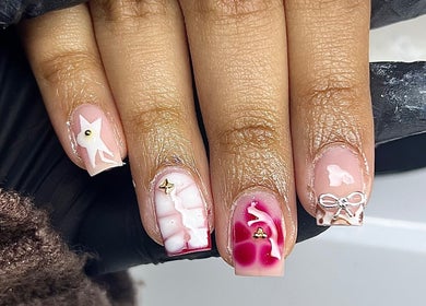 Intricate nail art design at Nailzbycharl, Swansea, Wales, GB showcasing unique manicure styles.