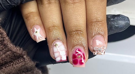 Intricate nail art design at Nailzbycharl, Swansea, Wales, GB showcasing unique manicure styles.