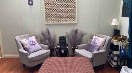 Relaxing seating area at Dana Jayne, Cmt in Oakland, California, US with plush chairs and calming decor.