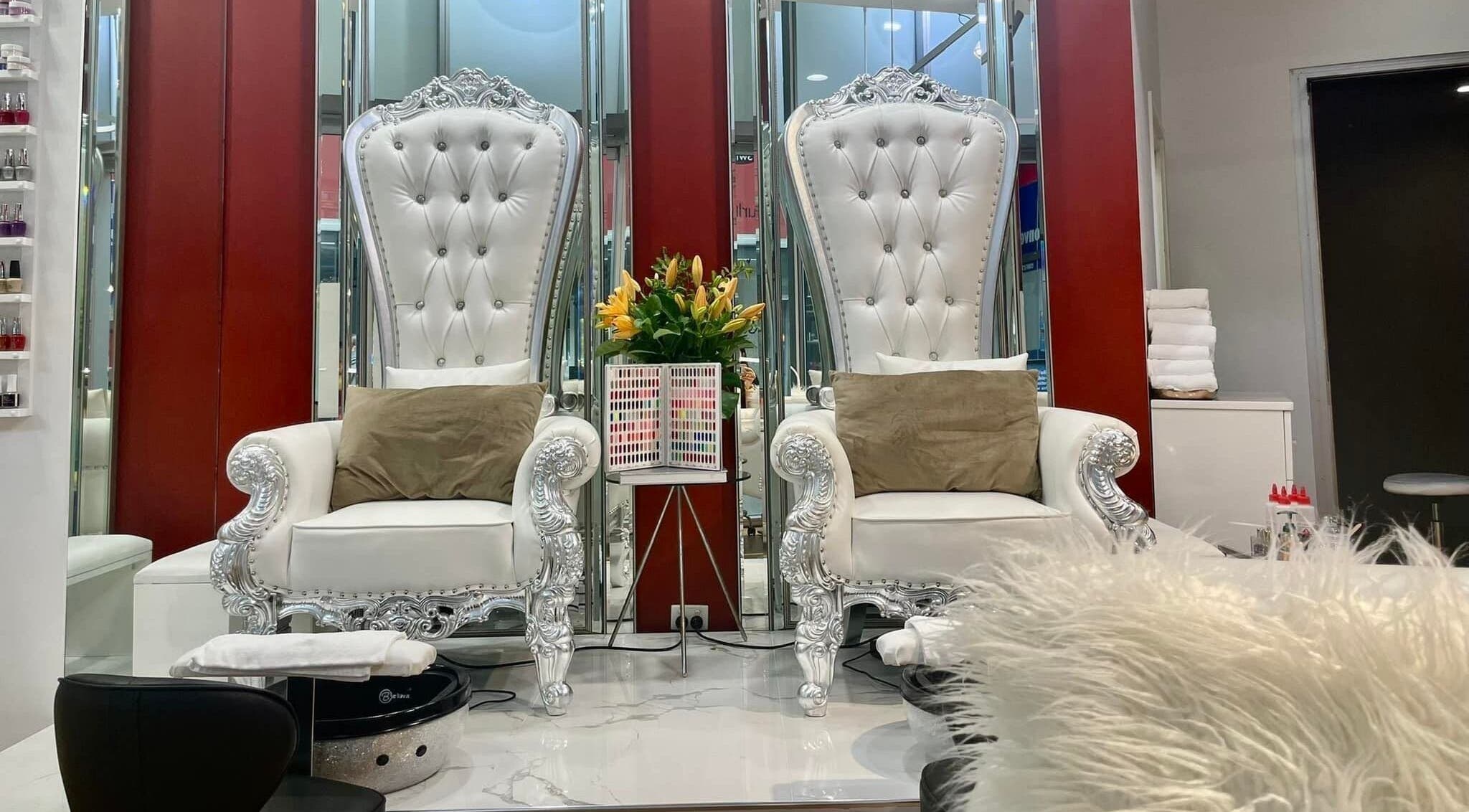 Luxurious seating at Champagne Hair & Nails, Surfers Paradise, Queensland, AU shows elegant decor.