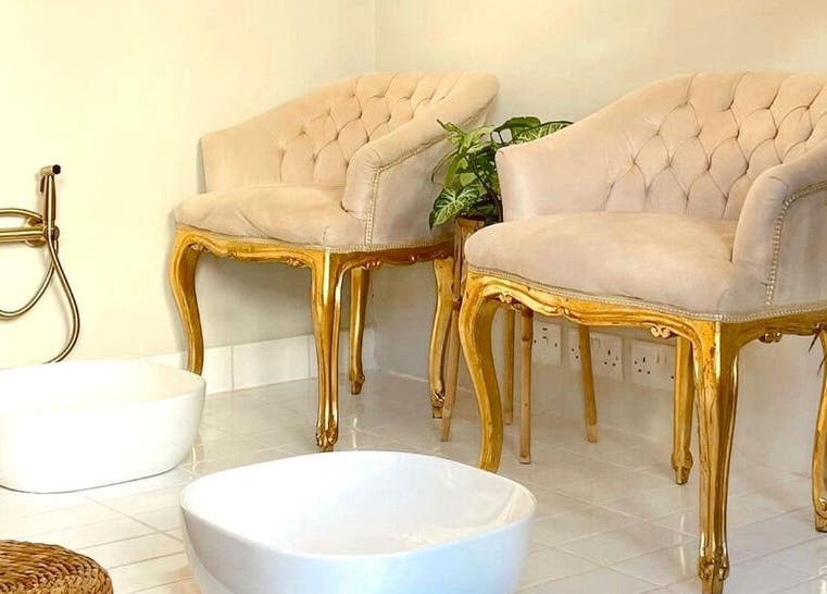 Luxurious pedicure seating area at Nail Impress by Toyah, In-naxxar, Malta, MT with plush chairs and foot basins.