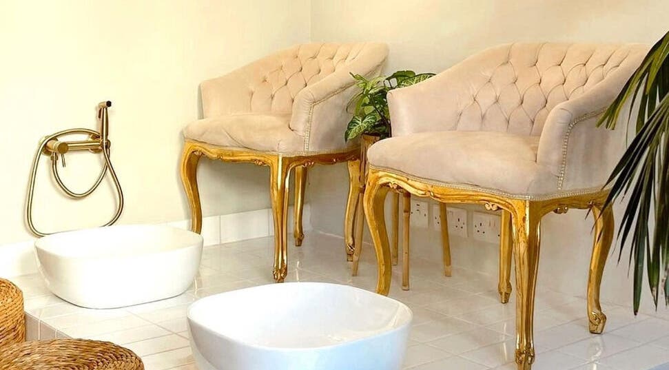 Luxurious pedicure seating area at Nail Impress by Toyah, In-naxxar, Malta, MT with plush chairs and foot basins.