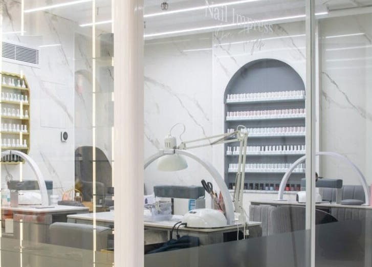 Chic interior of Nail Impress by Toyah in In-naxxar, Malta, MT with modern nail stations and stylish decor.