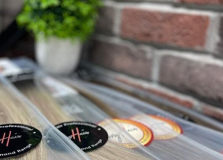 Hair extensions on display at Tito & Tuthill Ladies Salon, Dubai, AE, emphasizing premium luxury options.