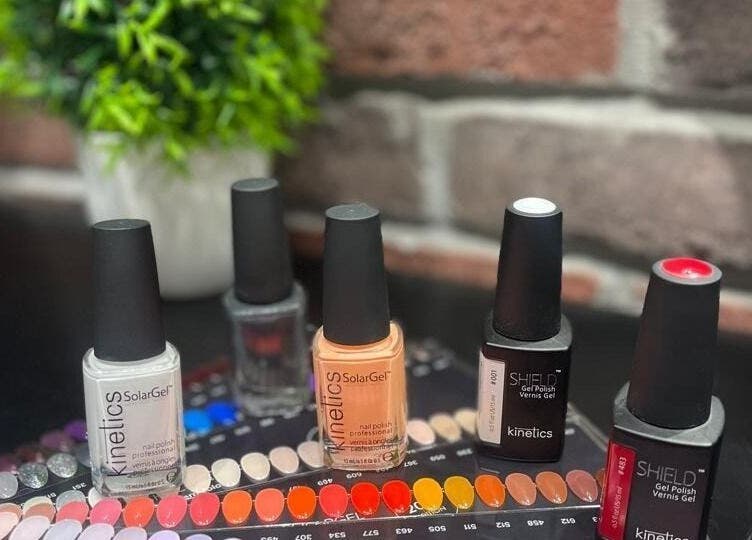 Tito & Tuthill Ladies Salon in Dubai, AE offers a vibrant range of nail polishes displayed elegantly.