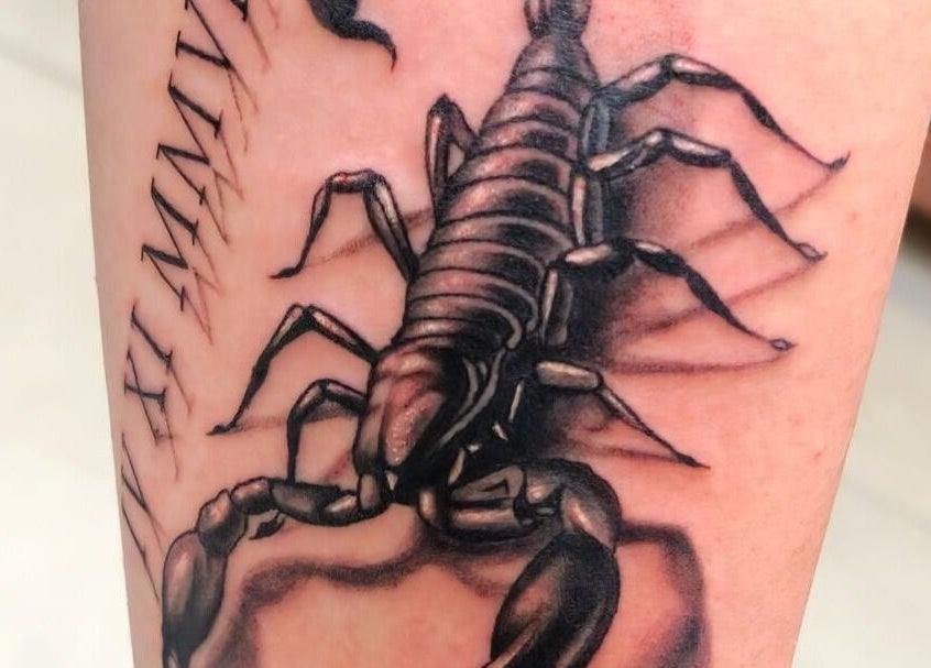 Detailed scorpion tattoo at Teddington Ink, Teddington, England, GB, showcasing fine artistry and intricate details.