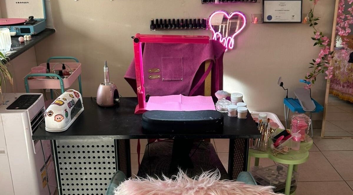 Elegant nail station at Nails By Ruth Kimberley, Merrylands, New South Wales, AU. Cozy setup with pink decor.