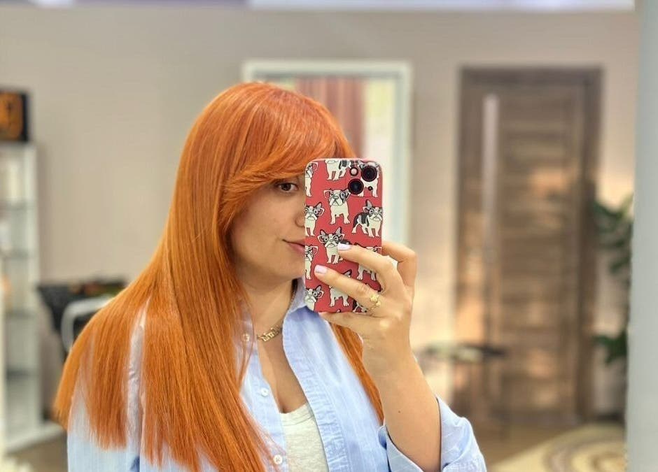 Woman with vibrant red hair at Vm.HairWorks Signature, Yerevan, Yerevan, AM, showcasing salon expertise.