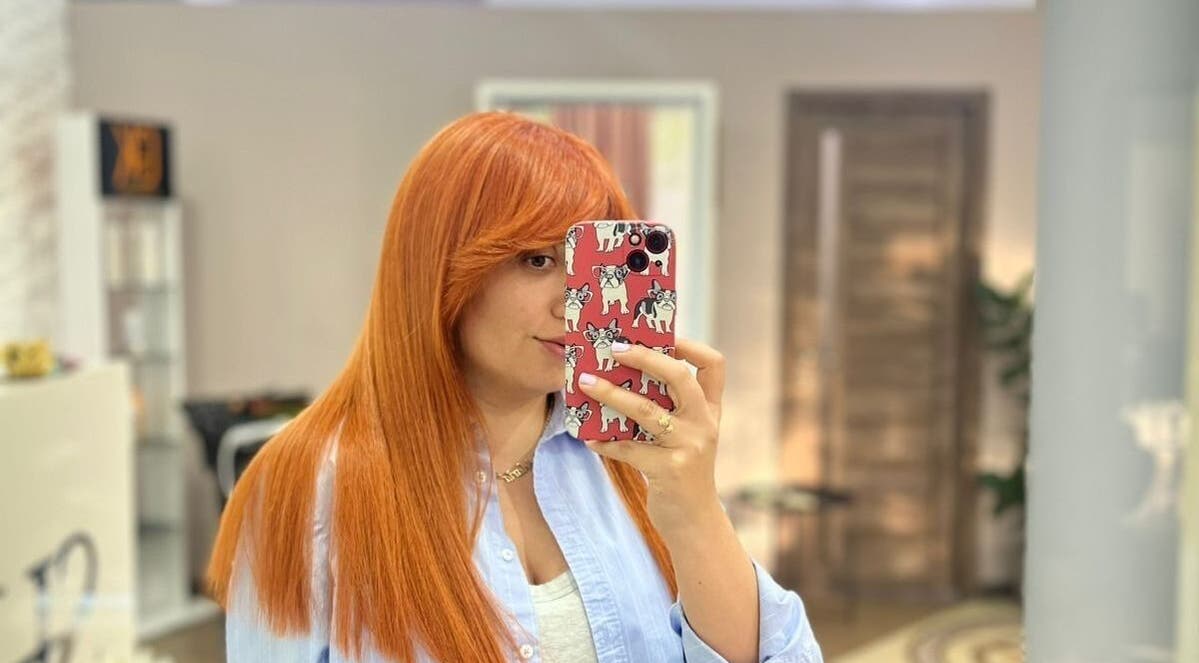 Woman with vibrant red hair at Vm.HairWorks Signature, Yerevan, Yerevan, AM, showcasing salon expertise.