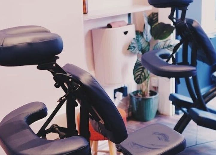 Massage chairs at Backworks, London, GB, offering a serene wellness environment for relaxation.