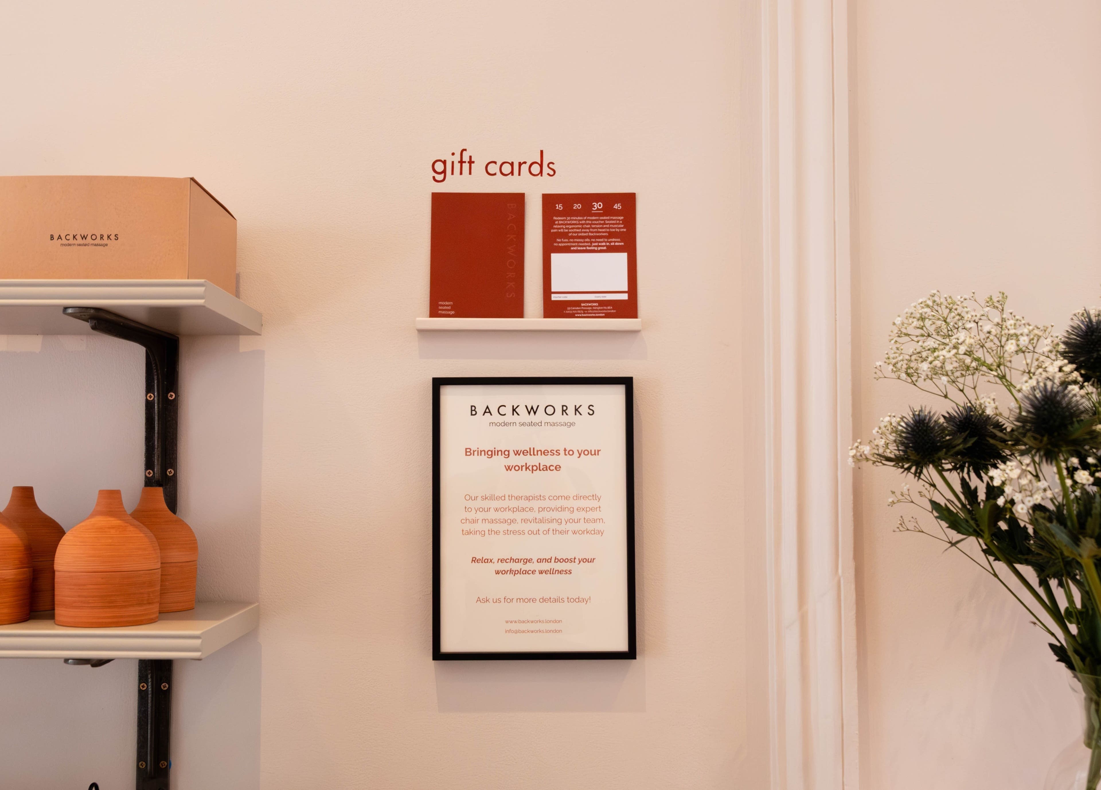 Gift cards and decor at Backworks in London, GB, offering serene wellness experiences.