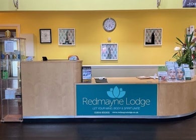 Reception at Wellbeing with Jaydene at Redmayne Lodge, Strensall, England, GB with vivid decor.