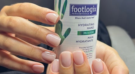 Perfectly manicured hands holding hydrating mousse at Beauty Hour By V, St. Julian's, MT.