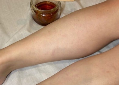 Leg waxing session at Beauty Hour By V in St. Julian's, MT, showcasing smooth, hair-free skin.