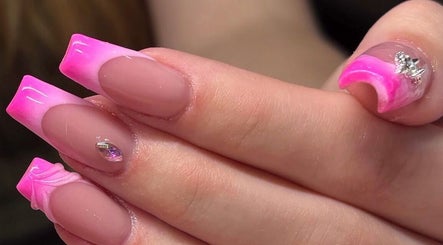 Vibrant pink ombre nails by Hana Nails Preston in Saskatoon, Saskatchewan, CA, showcasing elegance and style.