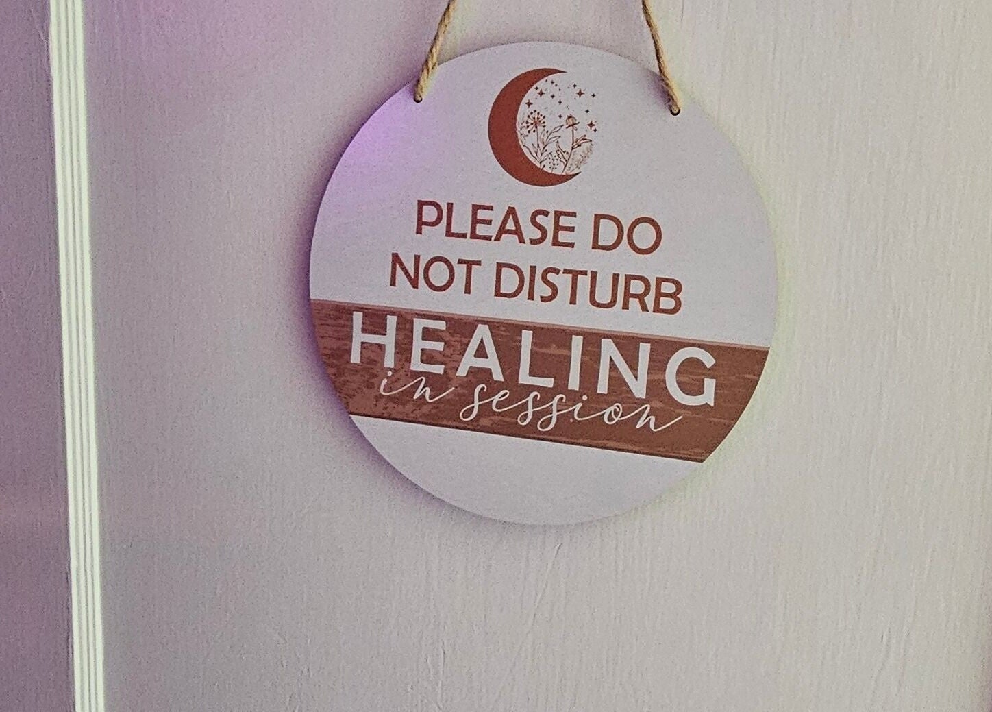 Door with 'Healing in Session' sign at Sherna's Synchronicities, LLC, California, Maryland, US.