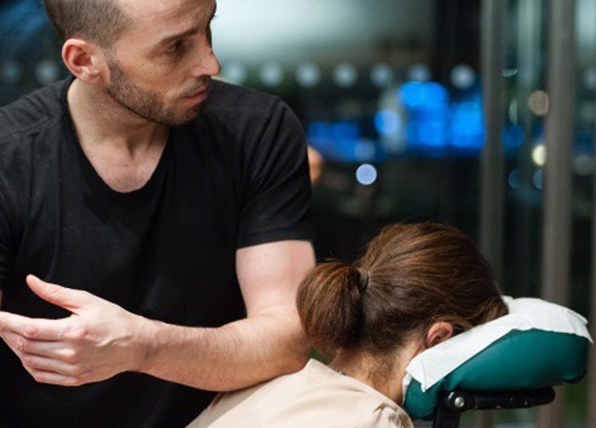 Therapist giving massage at Bloomsbury House, London, England, GB—relaxation and wellness.