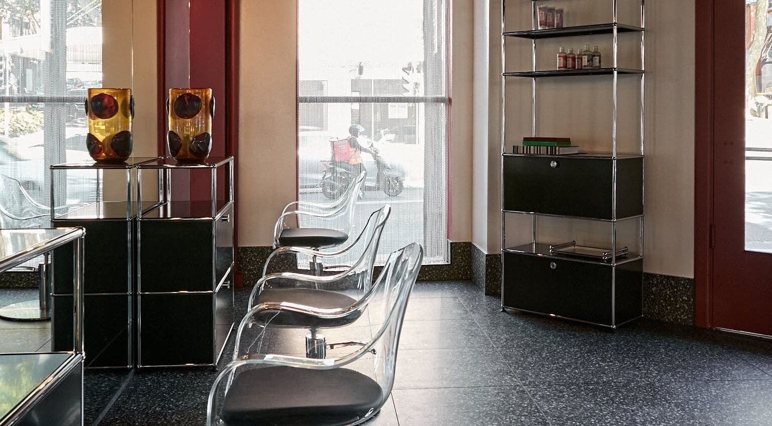 Stylish seating and minimalist decor at COV HAIR - Surry Hills, located in Surry Hills, New South Wales, AU.