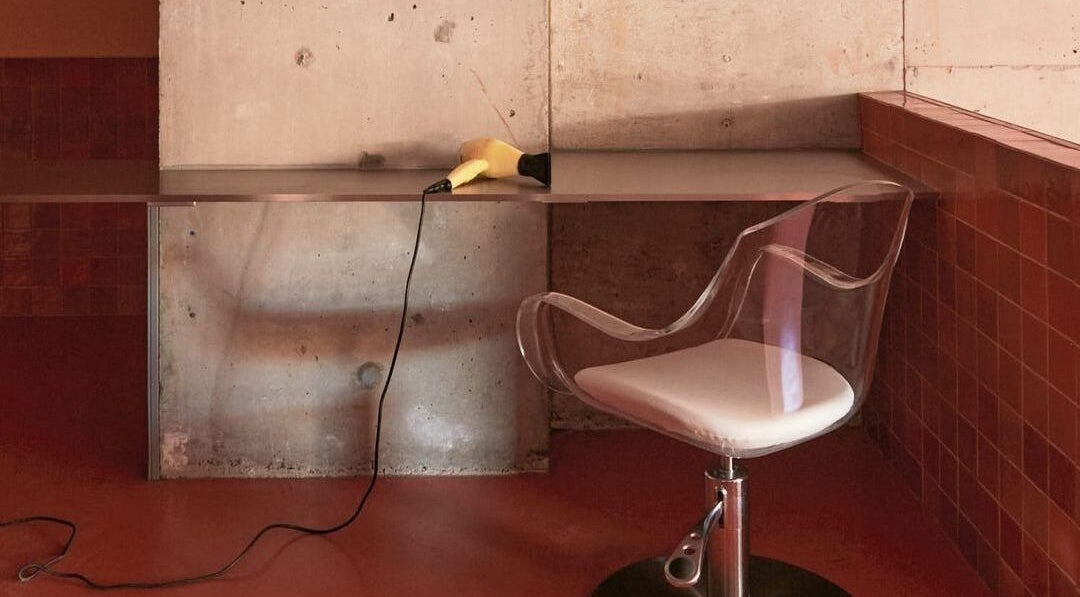 Minimalist salon chair and hairdryer at COV HAIR - Mosman, Mosman, New South Wales, AU.