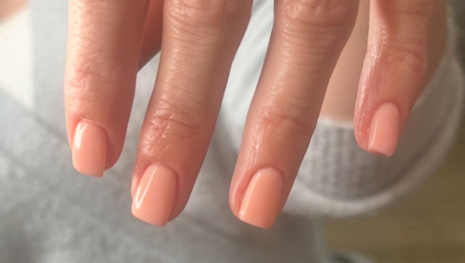 Beautiful peach manicure at The Mani X Muse, Alrewas, England, GB. Perfect for elegance and charm.