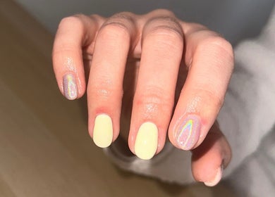 Shimmering holographic nails at The Mani X Muse, Alrewas, England, GB enhance elegance and style.