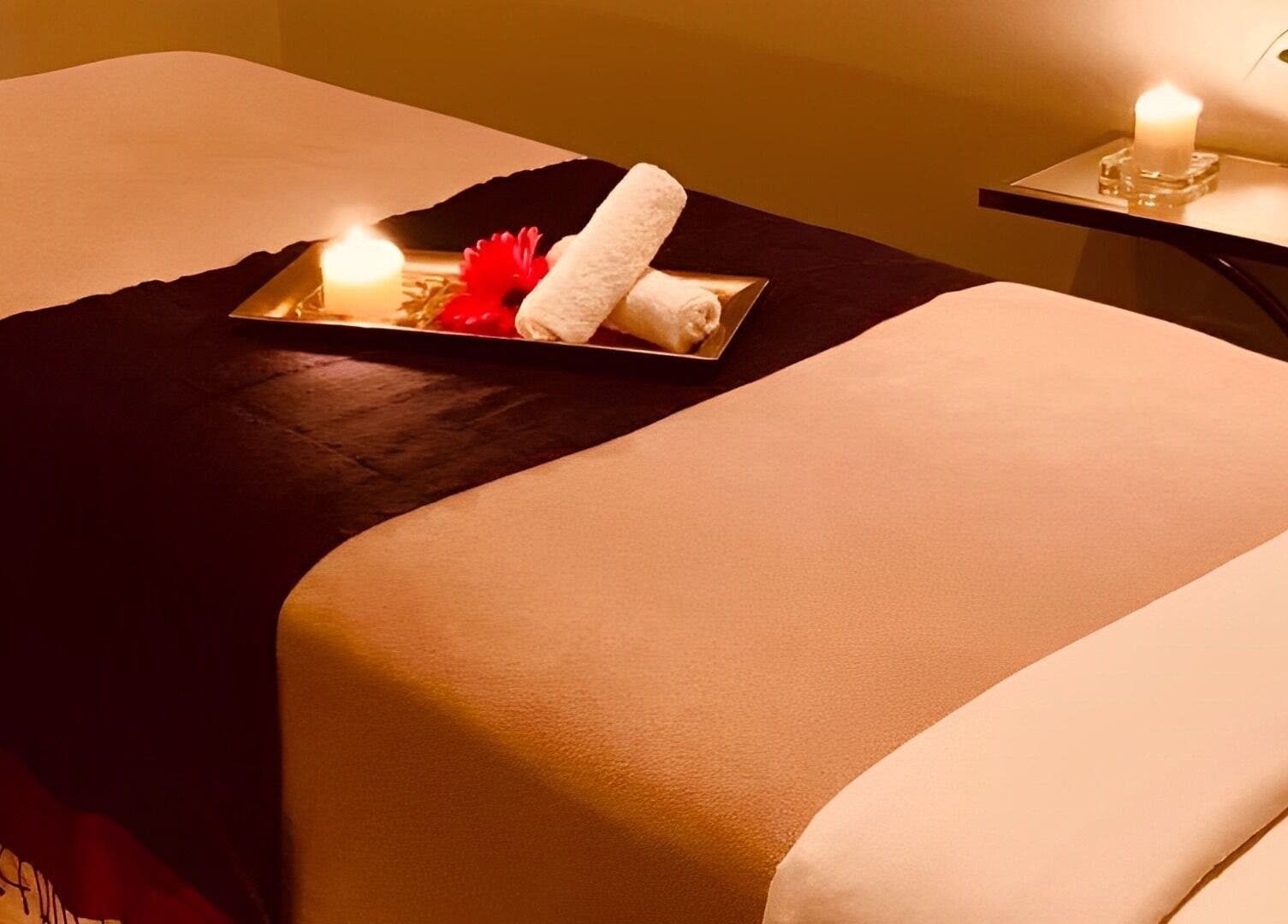 Luxurious massage setup at The Balay Spa, North Vancouver, British Columbia, CA with calming candles.