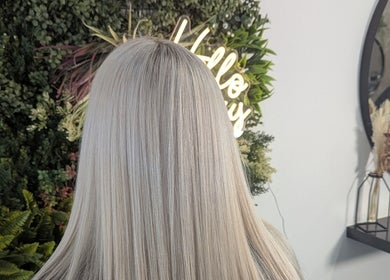 Sleek blonde hair against greenery at Pamela Connor, Dundee, Scotland, GB.