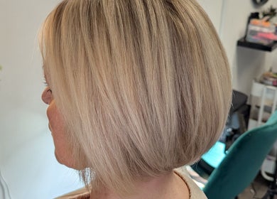 Stylish blonde bob hairstyle at Pamela Connor, Dundee, Scotland, GB beauty salon.