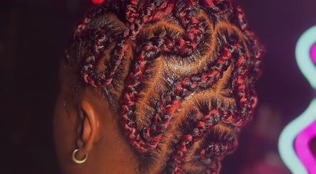Intricate braided hairstyle at Miha Beauty, Manchester, England, GB, showcasing detailed hair artistry.