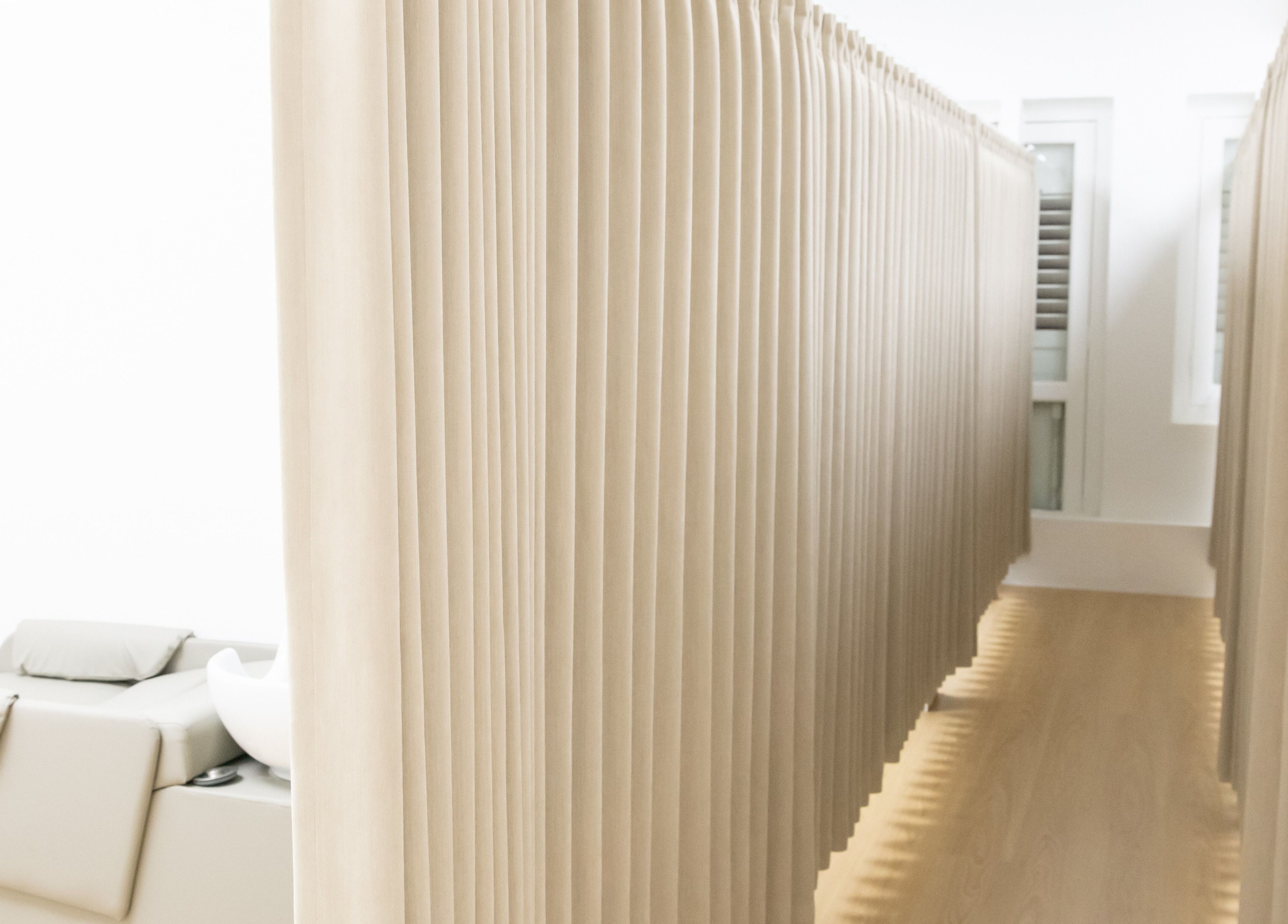 Elegant salon interior with soft lighting at M.Y Refresh HairLab in Singapore, SG.