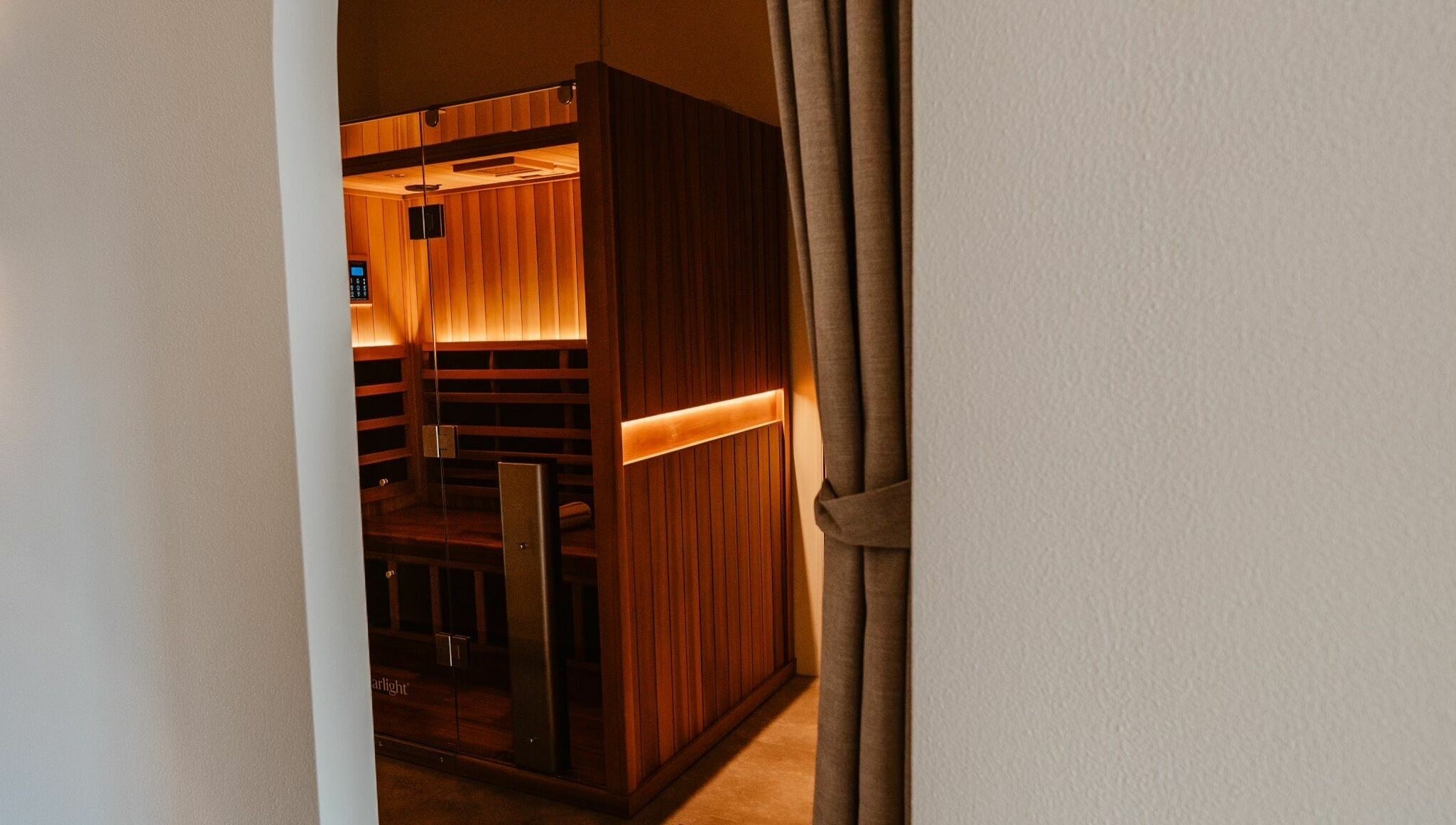 Experience relaxation at Aura Sweat's infrared sauna in Thirroul, New South Wales, AU. Warm wood tones invite tranquility.