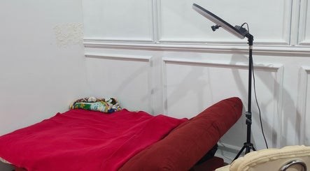Comfortable treatment bed with lamp at Precious Beauty Studio, Shah Alam, Selangor, MY.