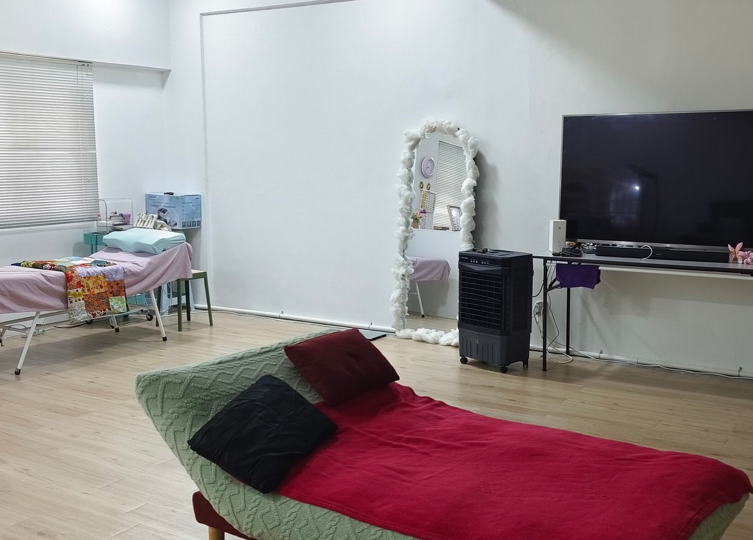 Relaxing treatment room at Rainbow Nail Spa, Subang Jaya, Selangor, MY with cozy decor and ambient lighting.