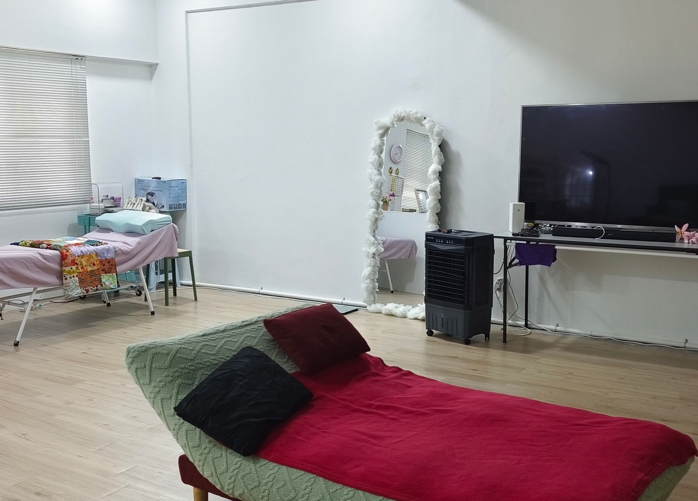 Spacious treatment room at Rainbow Nail Spa in Subang Jaya, Selangor, MY, featuring a cozy setup.